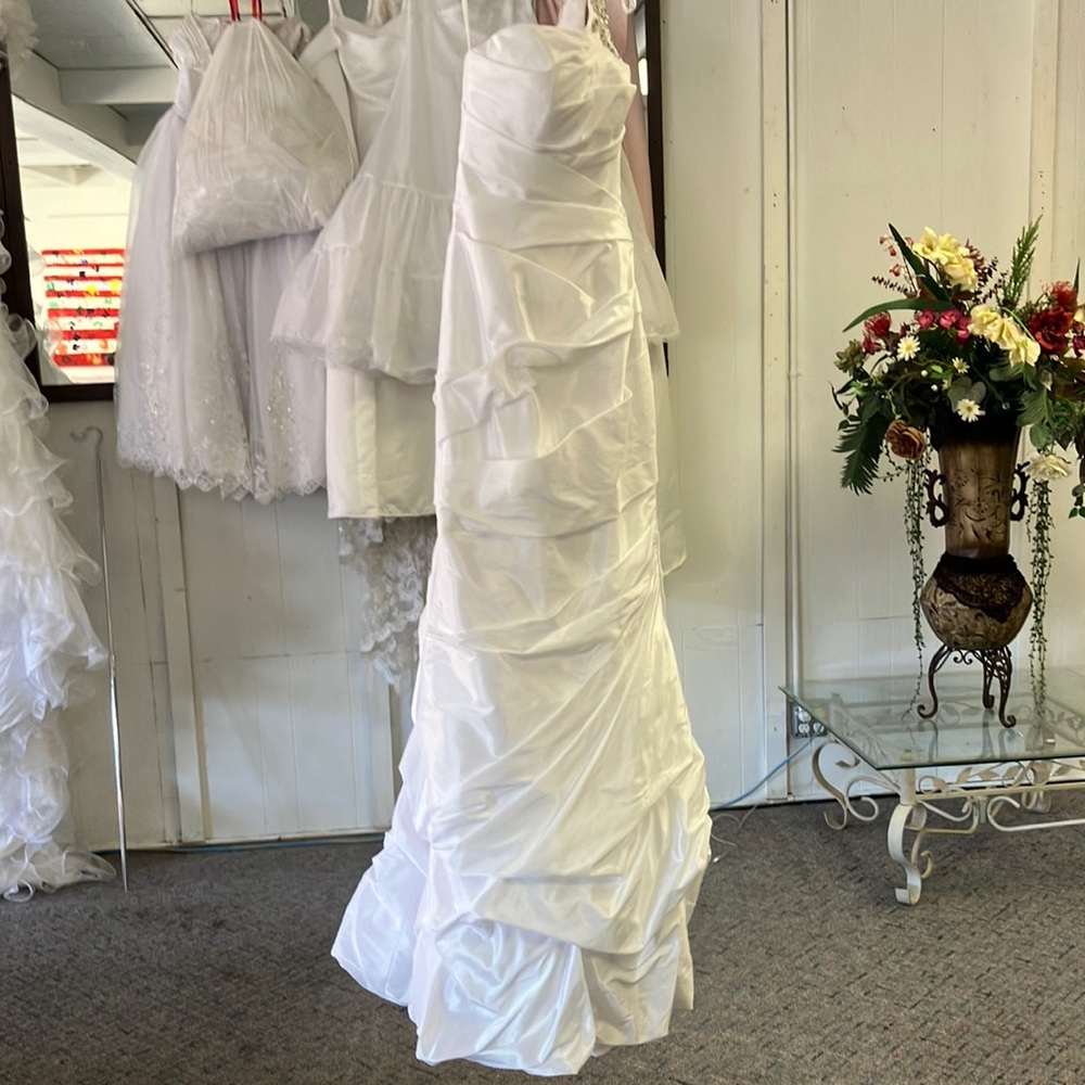 Form fitting satin wedding dress